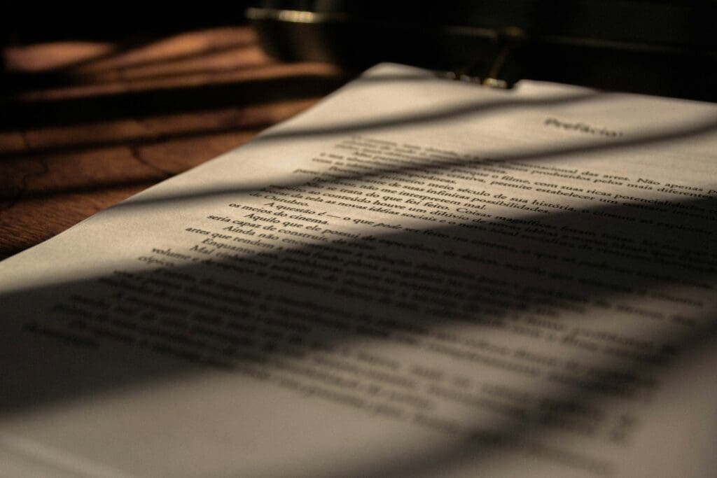 white book page on brown wooden table